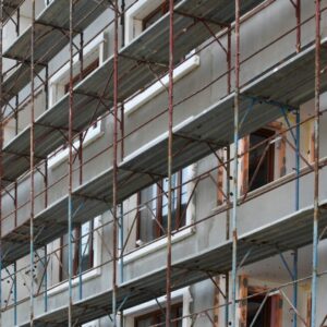 Beautiful shot of metal steel bars and glass windows in the building